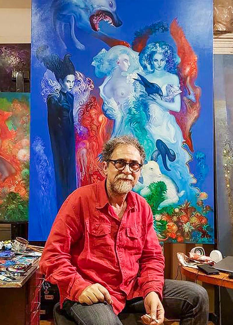 Željko Đurović, Serbian fantastic art painter, photographed in front of his paintings